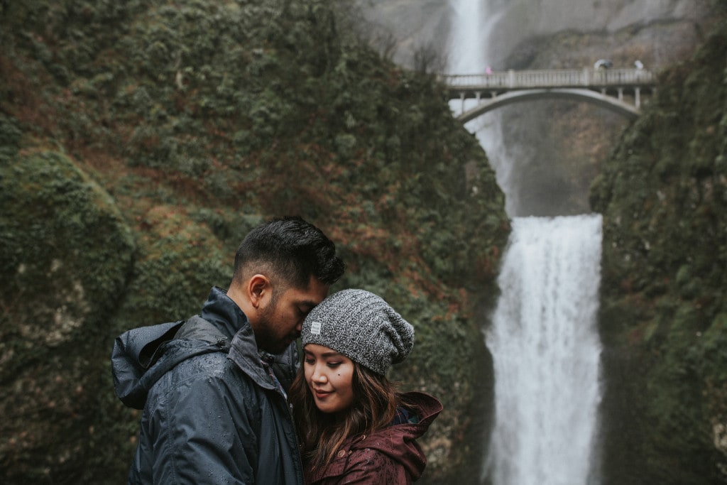 couple in front of Multnomah Falls by Marcela Pulido Portland Wedding Photographer