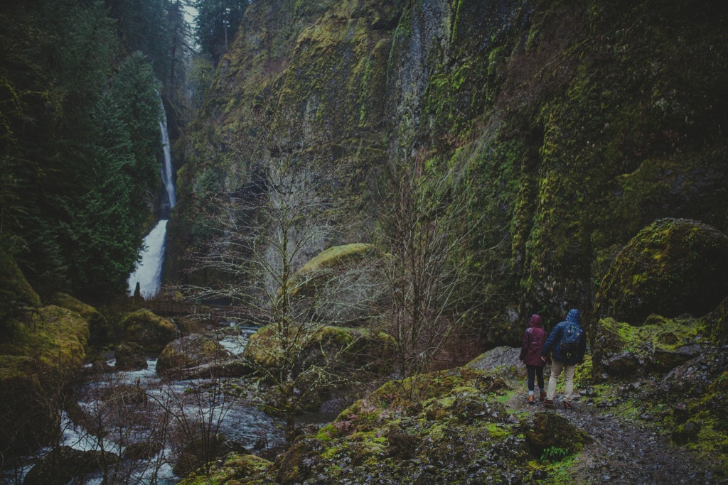 couple hiking pacific northwest wahclella falls by Marcela Pulido Portland Wedding Photographer