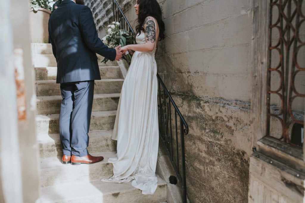 tattoo bride and groom on stairs Portland Opal 28 Wedding Photographer Marcela Pulido