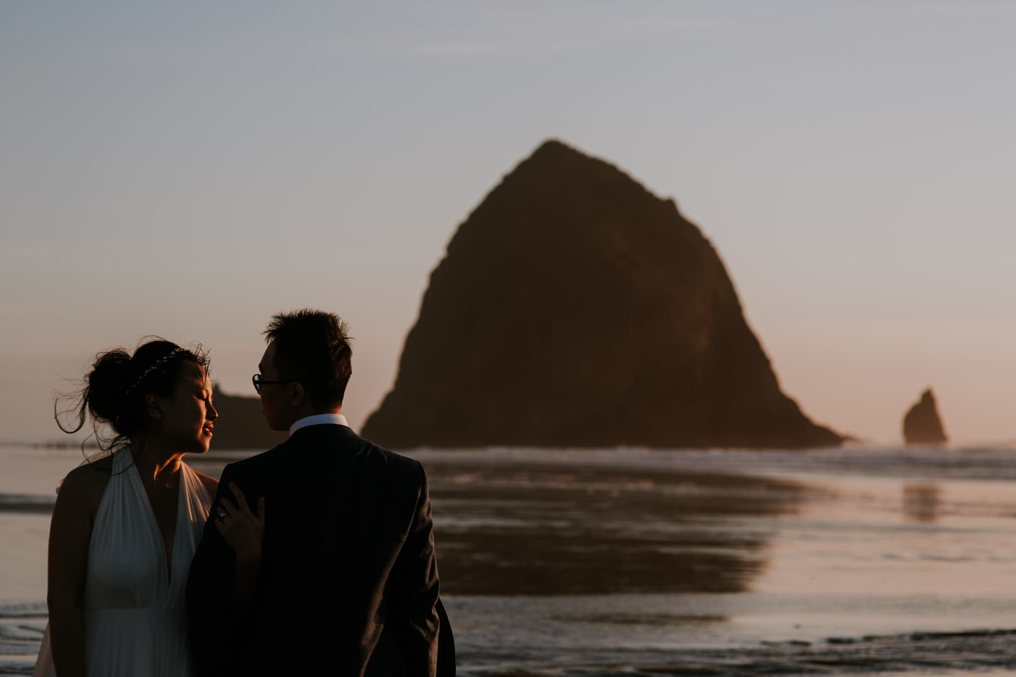 haystack rock cannon beach oregon coast wedding portraits Portland Wedding Photographer Marcela Pulido