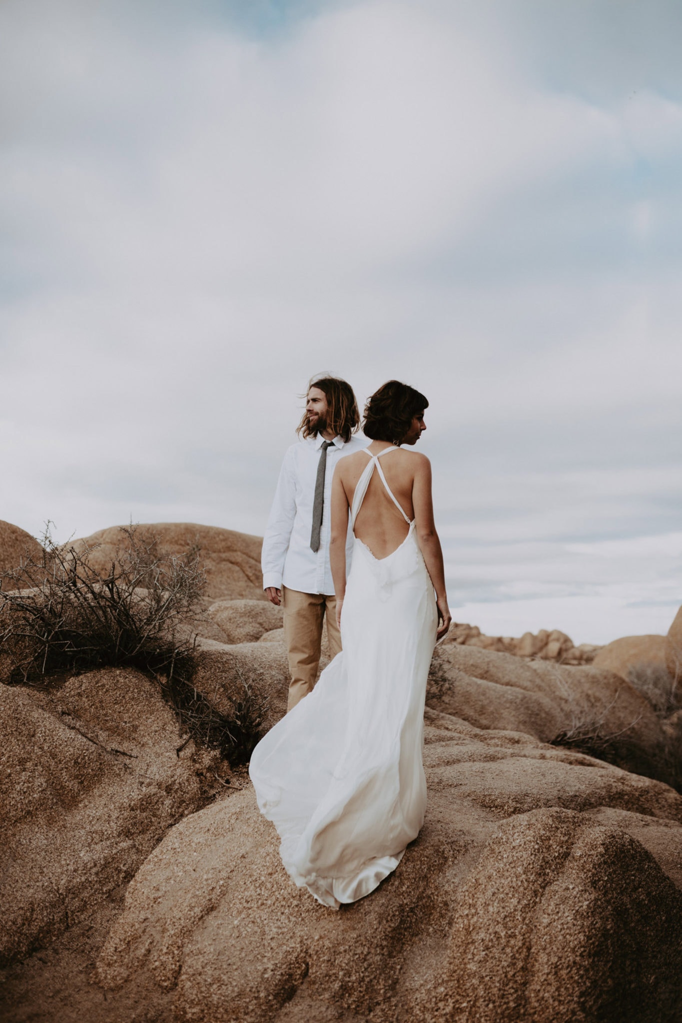 beautiful backless gown featured on huffington post Joshua Tree Elopement Skull Rock Marcela Pulido Portland Wedding Photographer