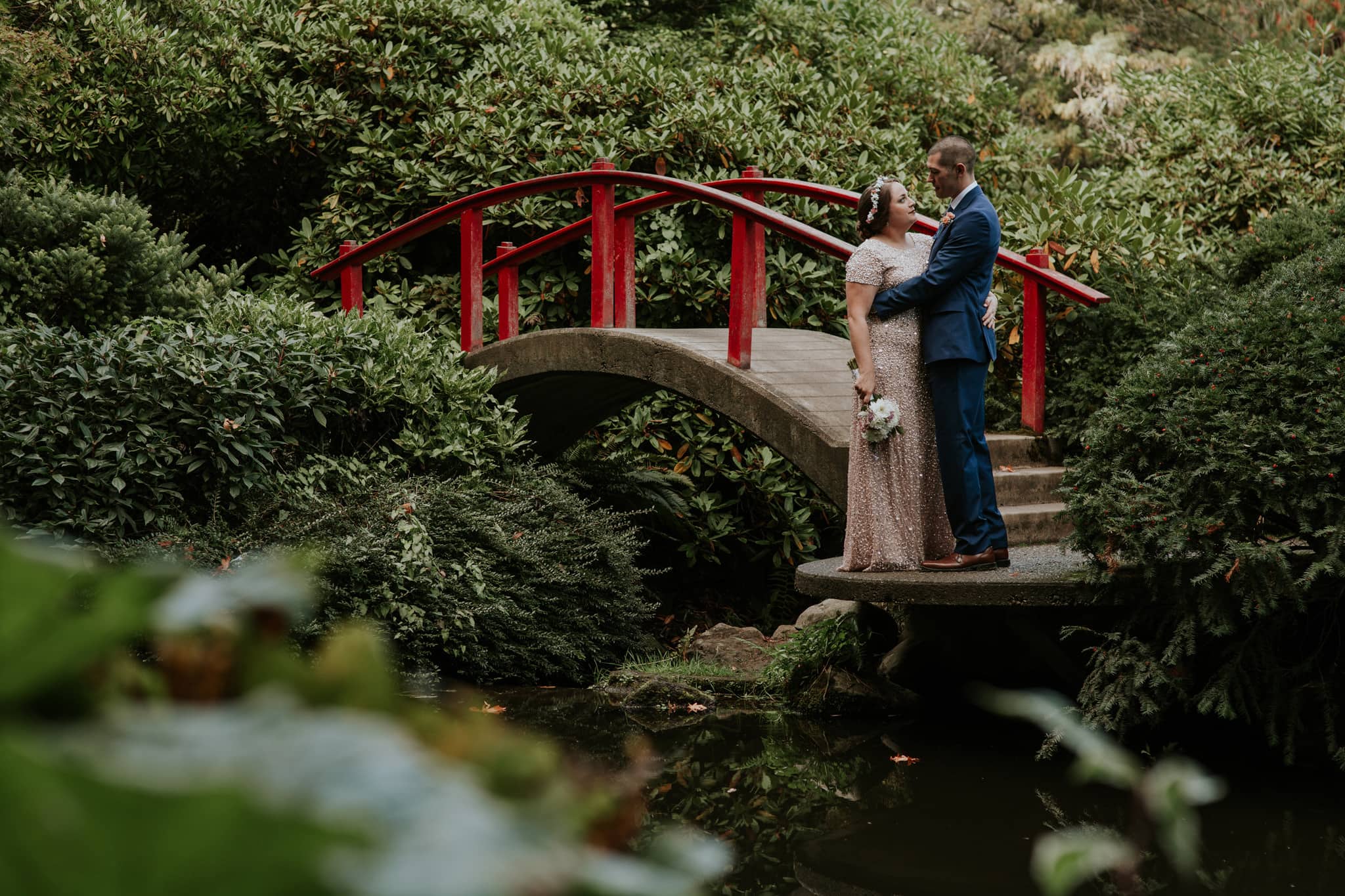 bride and groom portrait red bridge Kubota Garden Wedding by Marcela Pulido Photography Portland Wedding Photographer