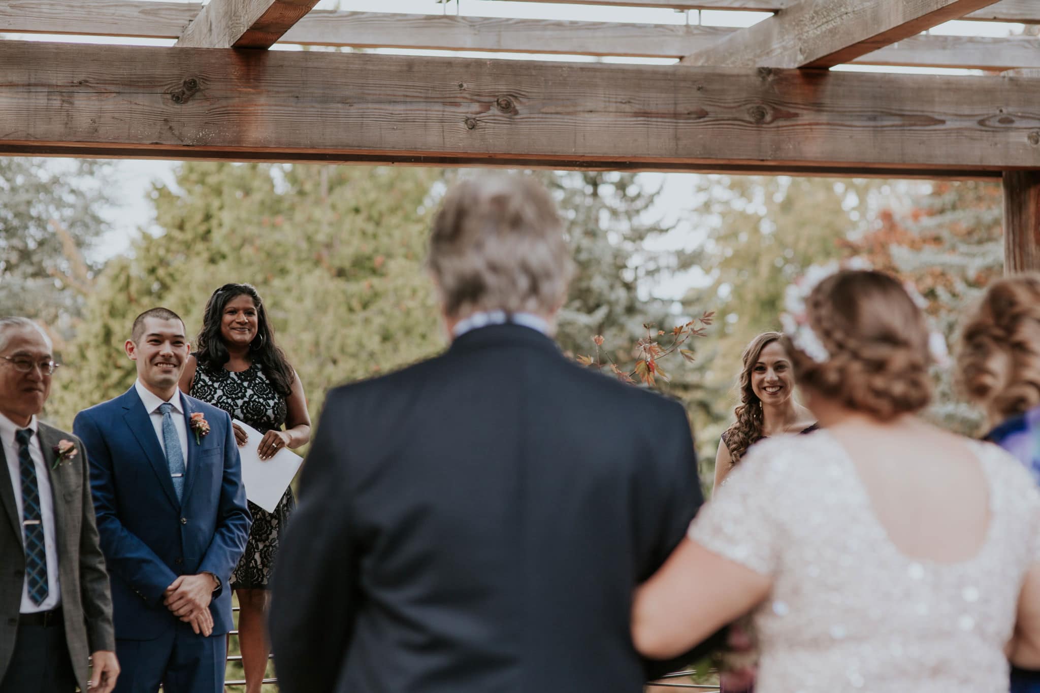 bride walks down aisle groom grins Kubota Garden Wedding by Marcela Pulido Photography Portland Wedding Photographer