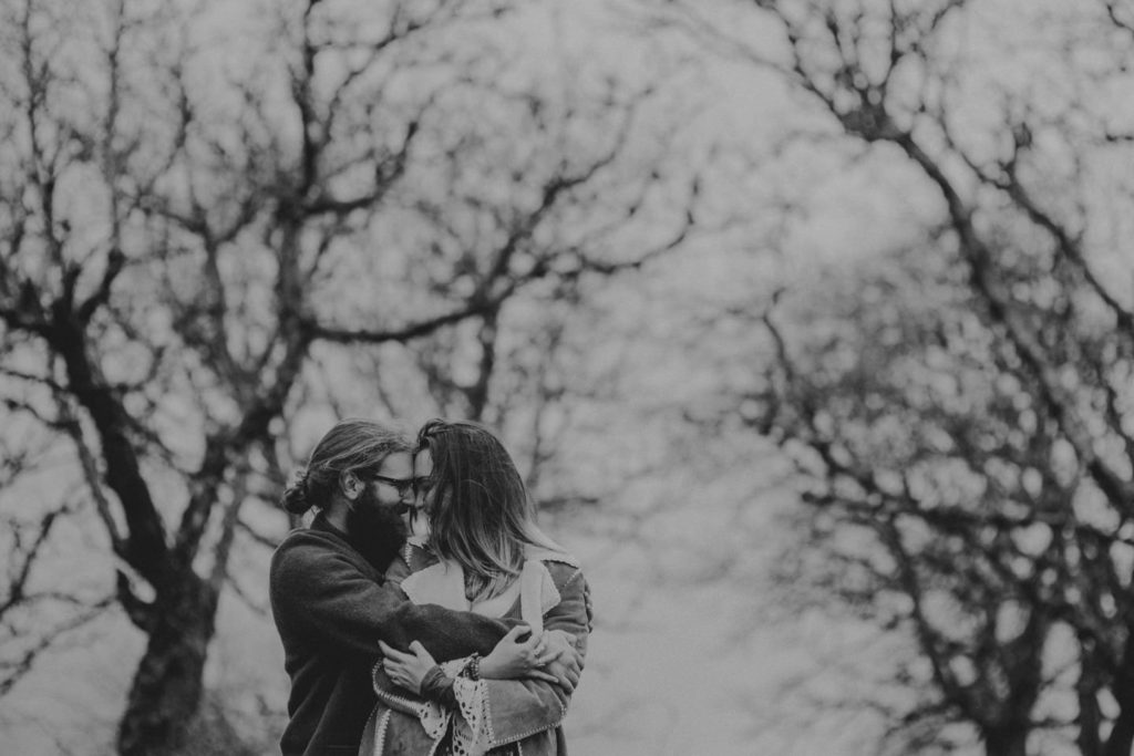 black and white hippie couple in forest Powell Butte Portland Engagement Photographer by Marcela Pulido Photography Portland Wedding Photographer