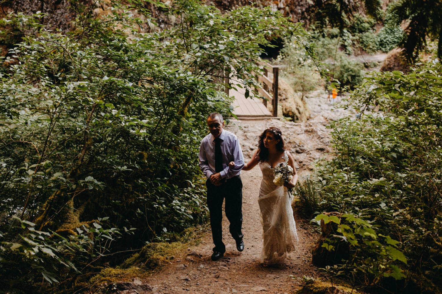 father walks bride down aisle at Wahclella Falls Oregon Columbia River Gorge elopement