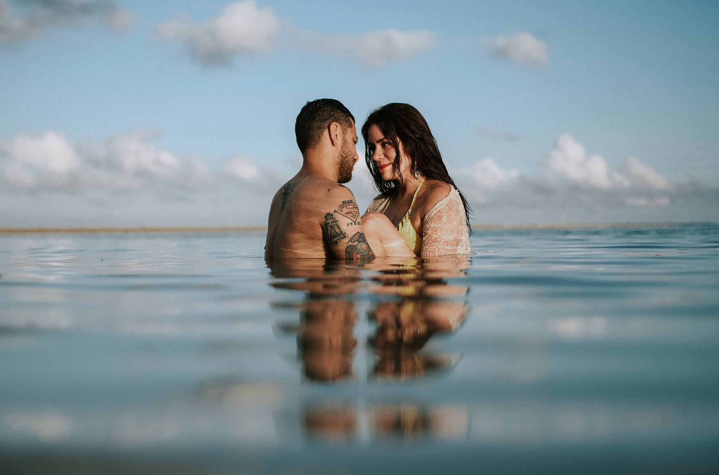 couple in the water embracing in Nadi Fji engagement photographer