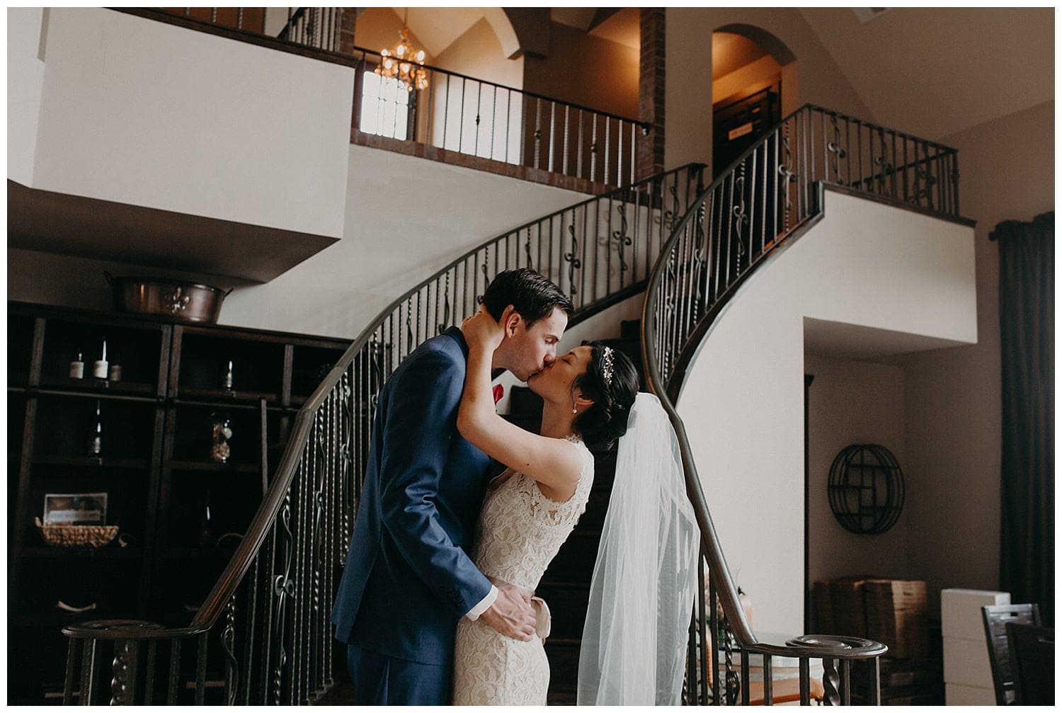 cute couple kissing at base of staircase beacon hill wedding