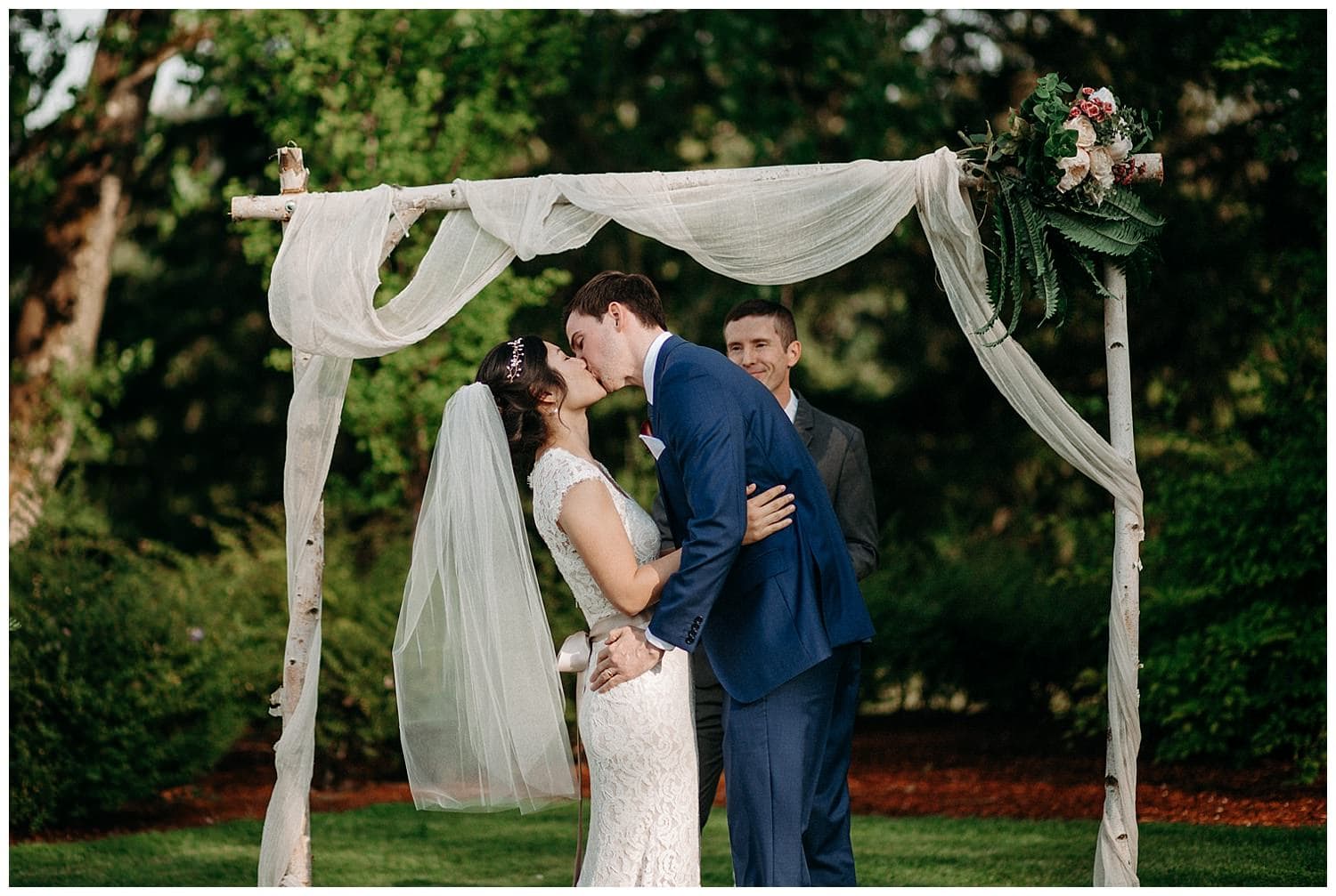 couple's first kiss at beacon hill wedding