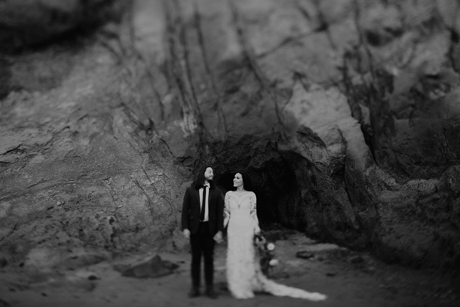 black and white tilt shift photo of wedding day rue de seine gown cape kiwanda elopement by marcela pulido portland oregon wedding photography