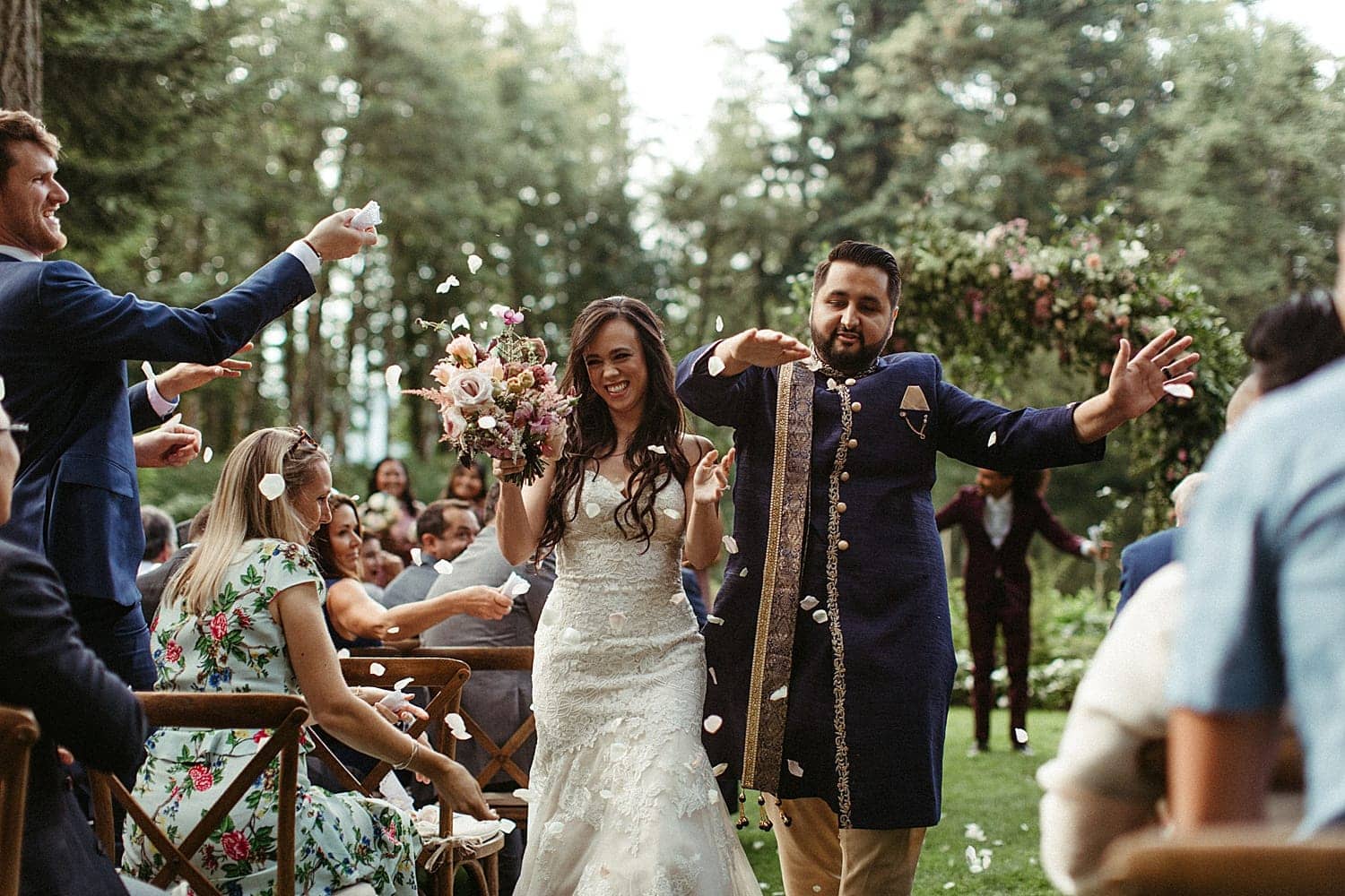 happy just married indian newlyweds at bridal veil lakes wedding venue by marcela pulido photography portland wedding photographer