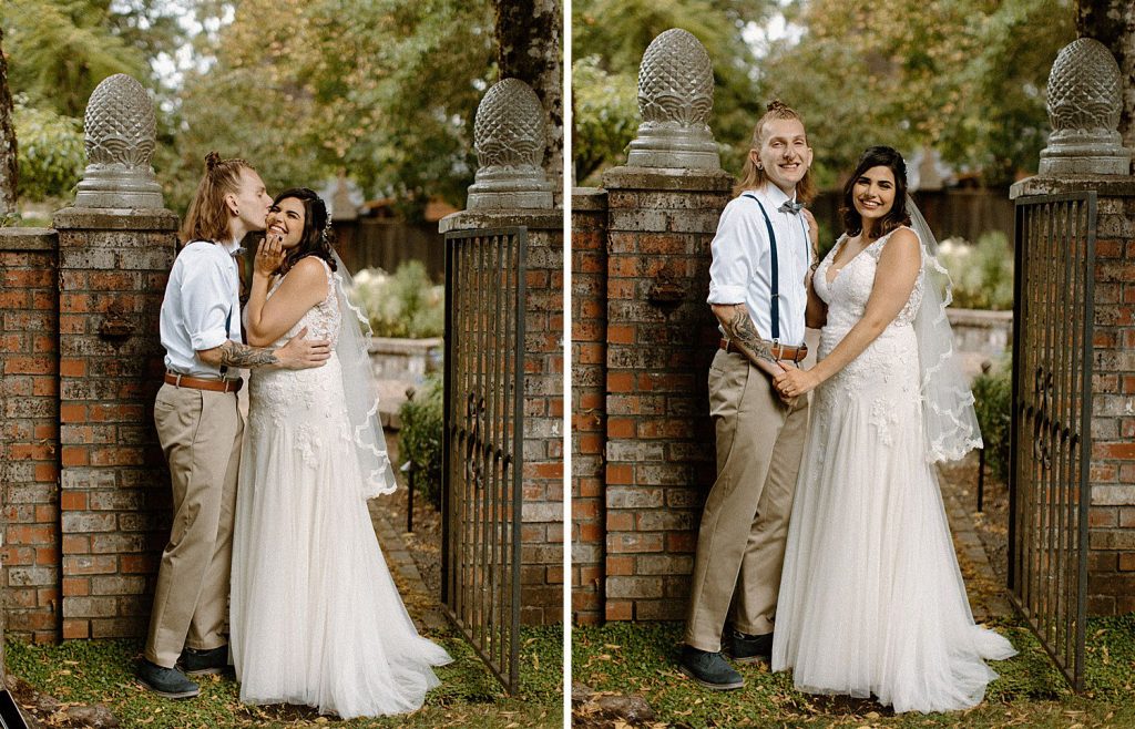 bride and groom kiss at this brick fence at their french country cottage wedding in lakewood washington